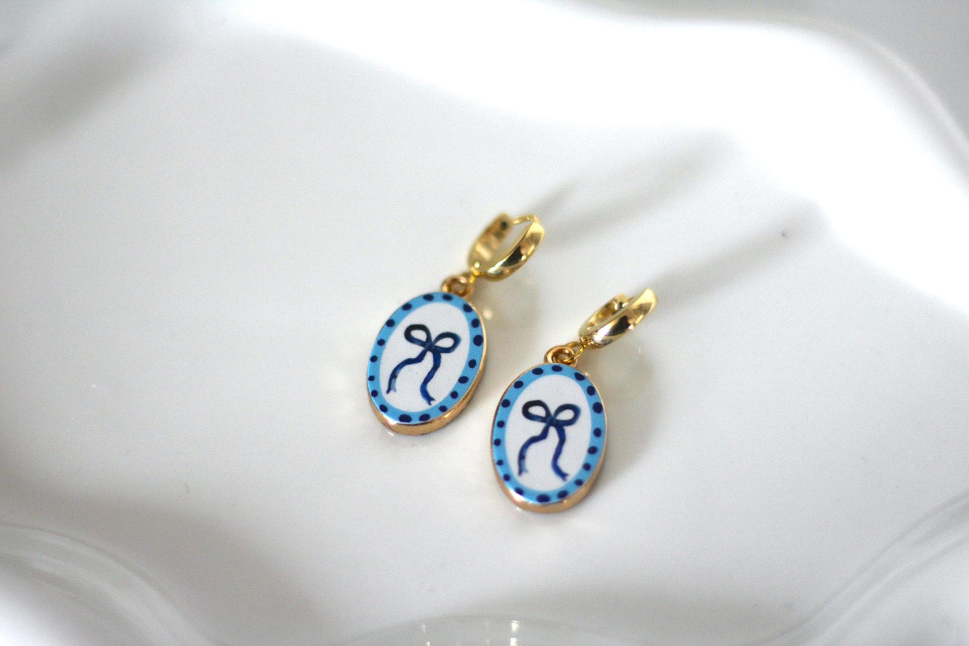 Coquette blue ribbon bow huggie hoop earring